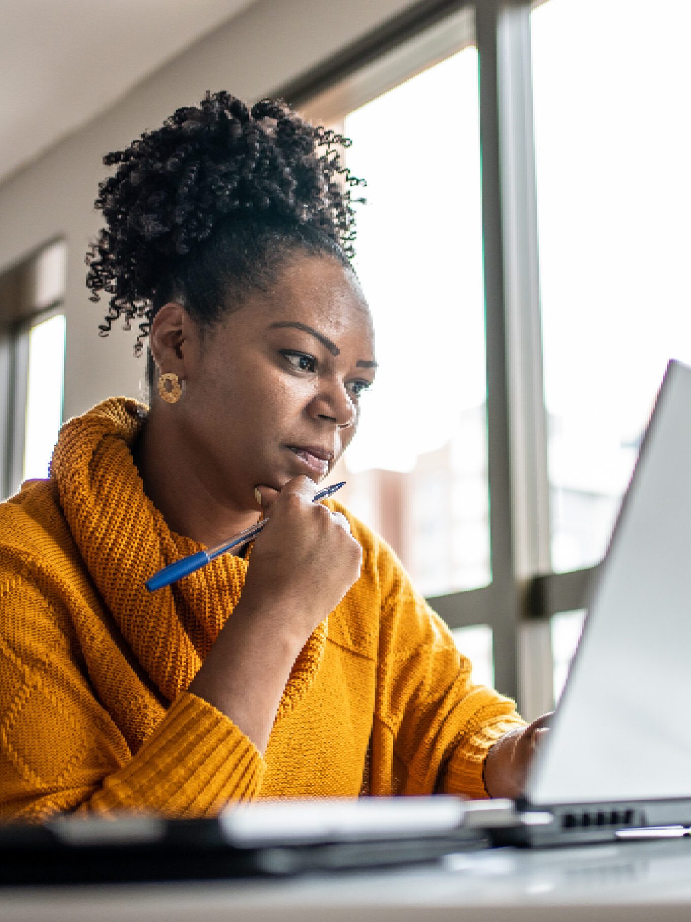 Woman Working on Computer on Microsoft Dynamics